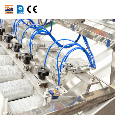 Automatic Cone Sleeving Device For Production Lines Operation In Food Processing Industries